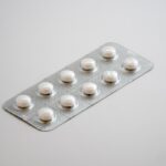 Prescription pills on table
